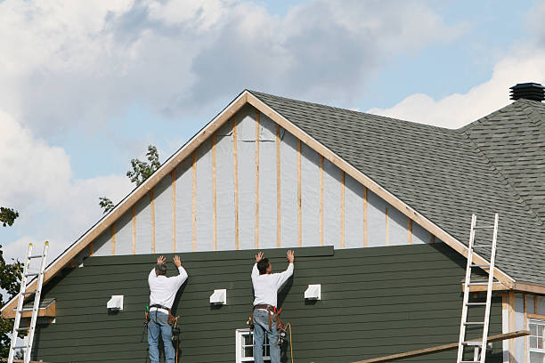 Professional Siding Installation technician working in Bellville, OH